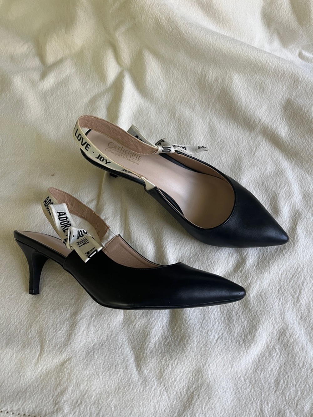 Catherines Black Pointed Slingback Heels with White Logo Ribbon